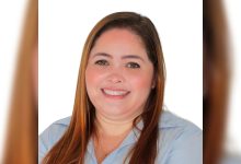 Juliana do Huguinho sorrindo.