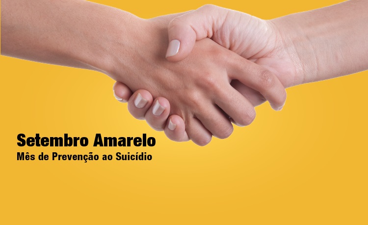 Cartaz da campanha Setembro Amarelo com foto de aperto de mãos.