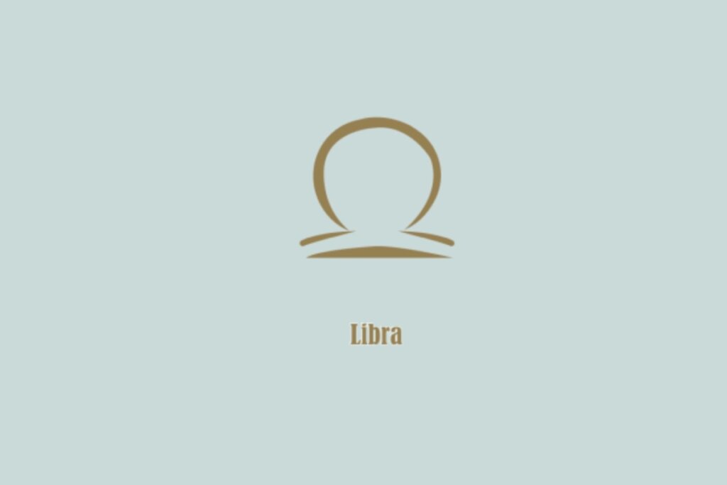 Símbolo dourado de Libra, composto por uma linha horizontal e um arco acima, com a palavra "Libra" abaixo, em fundo azul-claro