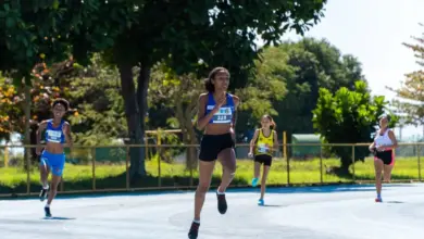 Atletas disputam prova de corrida durante os Jogos Escolares do Rio