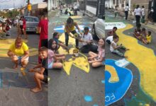 Alunos, professores e familiares participaram da pintura das ruas como parte do projeto “Copa 2026 e a Cultura”, que une educação, integração social e o espírito da Copa do Mundo.